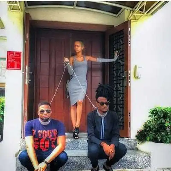 TV/radio personality Sammy Walsh puts 2 men on dog leashes (photo)